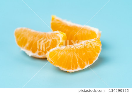 photo of tangerines on a blue background 134390555