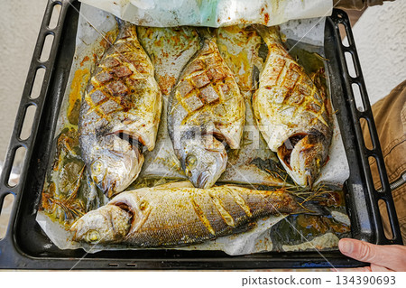 Baked Dorado Fish on Tray 134390693