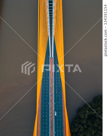 Symmetric modern cable-stayed bridge over Han river in Da Nang, Contemporary urban span connecting city across waterway 134391154