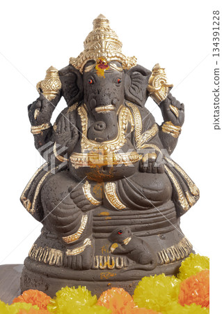 Ganesha Idol with Flower Garland on White Background 134391228