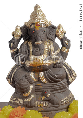 Clay Ganesha Idol with Colorful Flower Garland on White Background. Hindu Festival Decoration 134391231