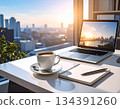 A desk overlooking the city while working remotely 134391260