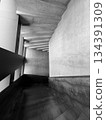 Abstract concrete stairwell in black and white with strong architectural lines and shadows 134391309