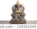 Ganesha idol with gold decoration for home decoration, spiritual blessing and Hindu worship, religious decoration 134391349