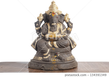Ganesha idol with gold decoration for home decoration, spiritual blessing and Hindu worship, religious decoration Ganesha idol with gold decoration for home decoration, spiritual blessing and Hindu worship, religious decoration 134391349