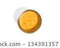 Spicy red chutney served in stainless steel bowl on white background. 134391357