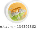 Idli served with chutney on a white plate, South Indian breakfast 134391362