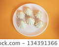 Six steamed sweet modak rice dumplings for Ganesh festival 134391366