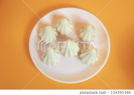 Six steamed sweet modak rice dumplings for Ganesh festival Six steamed sweet modak rice dumplings for Ganesh festival 134391366