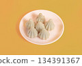 Six steamed sweet modak rice dumplings for Ganesh festival 134391367