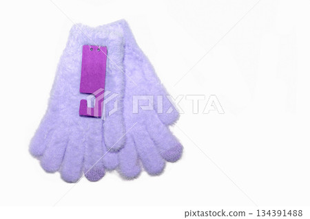 Fluffy children gloves in pastel colors on white background. 134391488