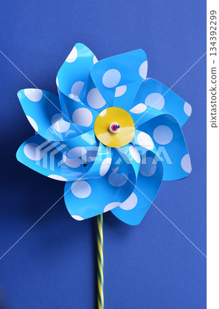 Pinwheel on Blue Background 134392299
