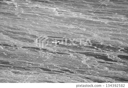 A Cessna flying over Nazca, Peru, South America 134392582