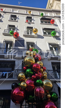 Festive christmas and new year decorations on urban building for holiday celebration and design inspiration 134392899