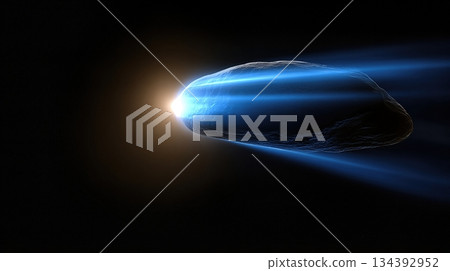 Glowing Comet Travels Across a Clear Black Sky Leaving a Bright Trail of Light 134392952