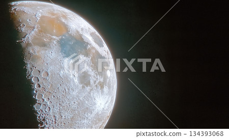Bright Full Moon Shines Brightly in the Night Sky Above a Quiet Landscape 134393068