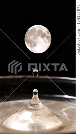 Moon Water Drop Creates Ripples Under Full Moon Reflection in Calm Atmosphere Moon Water Drop Creates Ripples Under Full Moon Reflection in Calm Atmosphere 134393073