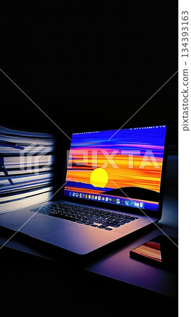 Colorful Laptop Setup in a College Dorm With Vibrant Sunset Wallpaper and Study Materials Colorful Laptop Setup in a College Dorm With Vibrant Sunset Wallpaper and Study Materials 134393163