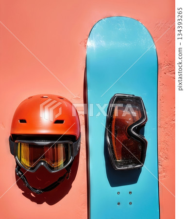 Minimalist Composition Featuring Vibrant Snowboard Helmet and Goggle Against a Colorful Backdrop Minimalist Composition Featuring Vibrant Snowboard Helmet and Goggle Against a Colorful Backdrop 134393265
