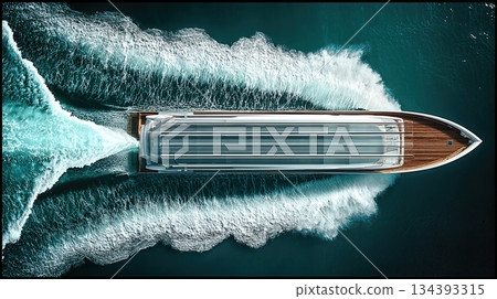 Large Yacht Moves Swiftly Through Clear Blue Water Creating White Waves Behind 134393315