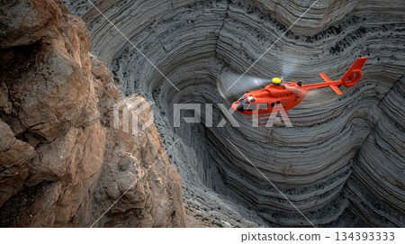 Rescue Helicopter Operates in the Vibrant Grand Canyon Landscape During a Dramatic Rescue Mission Rescue Helicopter Operates in the Vibrant Grand Canyon Landscape During a Dramatic Rescue Mission 134393333