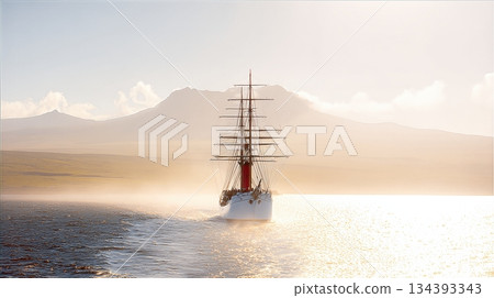 Majestic Sailing Ship Navigates Calm Sea at Dawn With Mountains in the Background 134393343