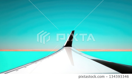 Airplane Wing Extending Over a Clear Turquoise Sky and Distant Horizon at Cruising Altitude 134393346