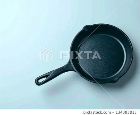Meal preparation. Cast iron pan. Kitchenware on white background. Top view. 134393815