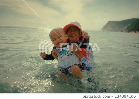 Joyful and Memorable Moments Spent at the Beach A Childs Delightful Playtime Experience Joyful and Memorable Moments Spent at the Beach A Childs Delightful Playtime Experience 134394100