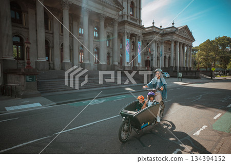Family Biking Adventure in Urban Setting with Historic Architecture 134394152