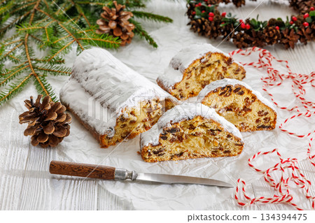 Stollen with filling of raisins, candied fruit Stollen with filling of raisins, candied fruit 134394475