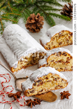 Stollen with filling of raisins, candied fruit Stollen with filling of raisins, candied fruit 134394476