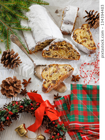 Stollen with filling of raisins, candied fruit Stollen with filling of raisins, candied fruit 134394483
