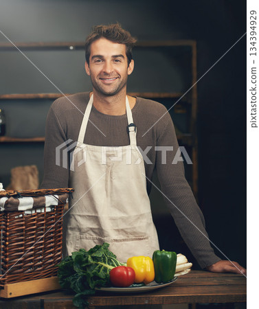 Chef, smile and portrait of man in kitchen with vegetables for vegetarian meal, healthy diet or vegan nutrition. Cooking, happiness and confident male cook from Canada in restaurant or small business 134394929