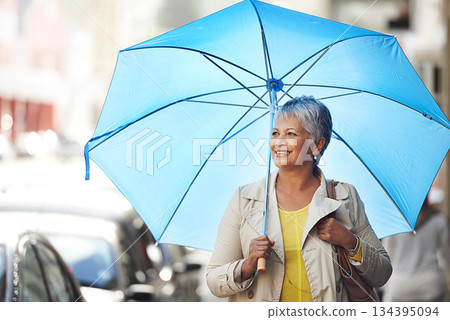 Walking, umbrella and senior happy woman on city commute, travel and smile on urban journey. Winter weather, happiness and female person looking at Mexico street view, commuting and walk on road Walking, umbrella and senior happy woman on city commute, travel and smile on urban journey. Winter weather, happiness and female person looking at Mexico street view, commuting and walk on road 134395094