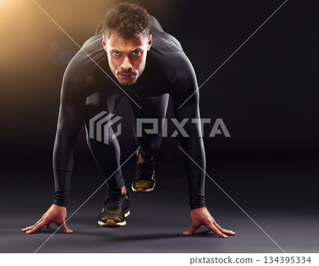 Man, portrait and runner ready to start, race or intense sport focus in studio background. Serious, professional athlete and running, training or cardio motivation to win, workout or exercise mockup Man, portrait and runner ready to start, race or intense sport focus in studio background. Serious, professional athlete and running, training or cardio motivation to win, workout or exercise mockup 134395334