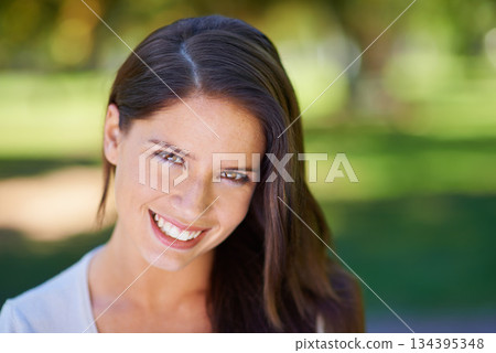 Face, happy and portrait of a woman in a park in summer for beauty, smile and confident in nature with happiness. Head, garden and female person or model outdoor with freedom, relax and in a forest Face, happy and portrait of a woman in a park in summer for beauty, smile and confident in nature with happiness. Head, garden and female person or model outdoor with freedom, relax and in a forest 134395348