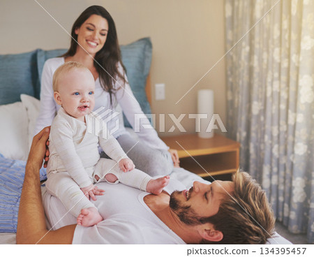 Happy mother, father and fun with baby in bedroom for love, care and quality time to relax together at home. Mom, dad and parents playing with infant kid for happiness, support or newborn development Happy mother, father and fun with baby in bedroom for love, care and quality time to relax together at home. Mom, dad and parents playing with infant kid for happiness, support or newborn development 134395457