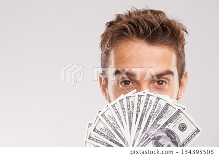 Man, portrait and money fan in front of face with cash, dollars and financial success isolated on studio background. Economic stability, finance and bonus with reward, wealthy male and mockup space 134395508