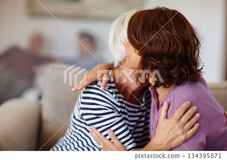 Woman, grandmother and hug on sofa in home with family, care and parent love or smile. Happiness, retirement and adult with elderly mom, together or reunion, hello and embrace and living room Woman, grandmother and hug on sofa in home with family, care and parent love or smile. Happiness, retirement and adult with elderly mom, together or reunion, hello and embrace and living room 134395871