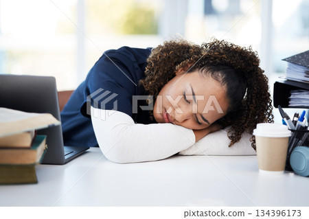 Woman, technology or sleeping medical student in tired, research books burnout or hospital learning fatigue. Stress, exhausted or asleep healthcare nurse by laptop in scholarship medicine internship 134396173