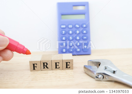 Photos of tools and free blocks indicating free construction costs and free estimates. Photos of tools and free blocks indicating free construction costs and free estimates. 134397033