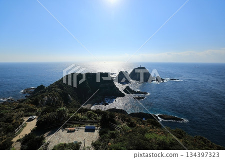 View of the Sata Cape Lighthouse from the Sata Cape Observatory (Minami Osumi Town, Kagoshima Prefecture, Japan) View of the Sata Cape Lighthouse from the Sata Cape Observatory (Minami Osumi Town, Kagoshima Prefecture, Japan) 134397323