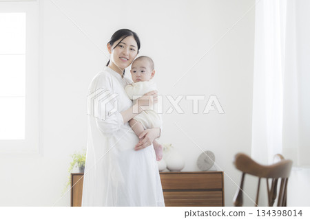 Young mother taking care of her baby 134398014