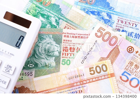 Hong Kong currency, Hong Kong dollar (HKD) banknotes and calculator 134398400