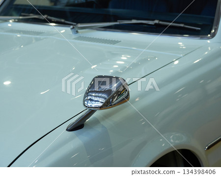 Beautiful paintwork and lines on the body of a car on display at the museum Beautiful paintwork and lines on the body of a car on display at the museum 134398406