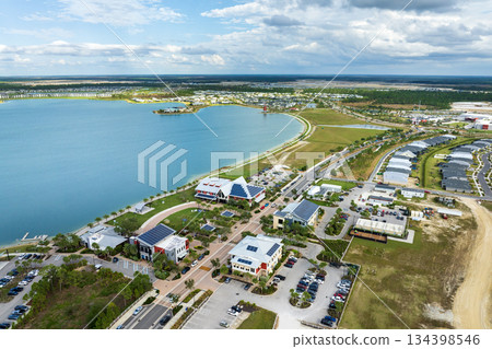 Photovoltaic panels for producing clean ecological electric energy. Florida office buildings with solar roofs. Renewable electricity with zero emission concept 134398546