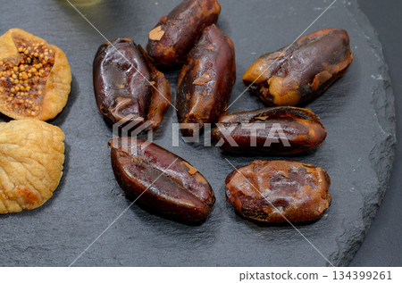 Relax with dried dates and figs 134399261