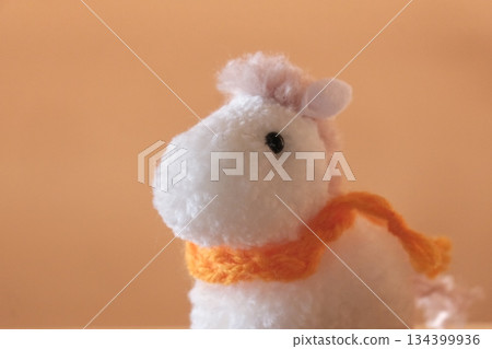 Pompom horse, white and orange scarf, diagonally from left Pompom horse, white and orange scarf, diagonally from left 134399936