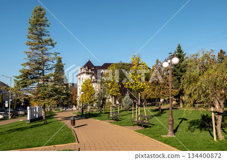 Autumn park path and trees in beautiful Piatra Neamt city 134400872